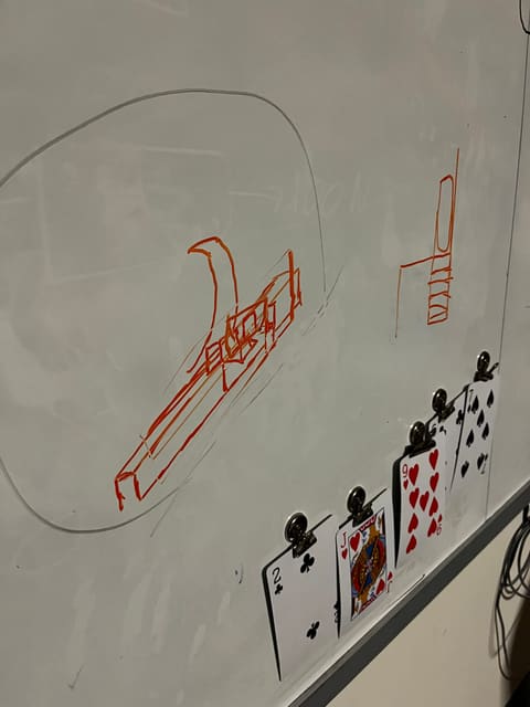 Whiteboard sketch of a battery mount
